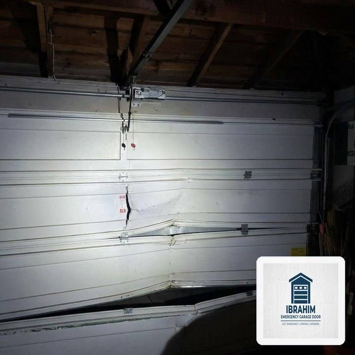Ibrahim Emergency Garage Door in Haltom City, TX: Heavy-Duty Steel Section Strut & 11-Gauge Hinge Reinforcement - Haltom City, TX